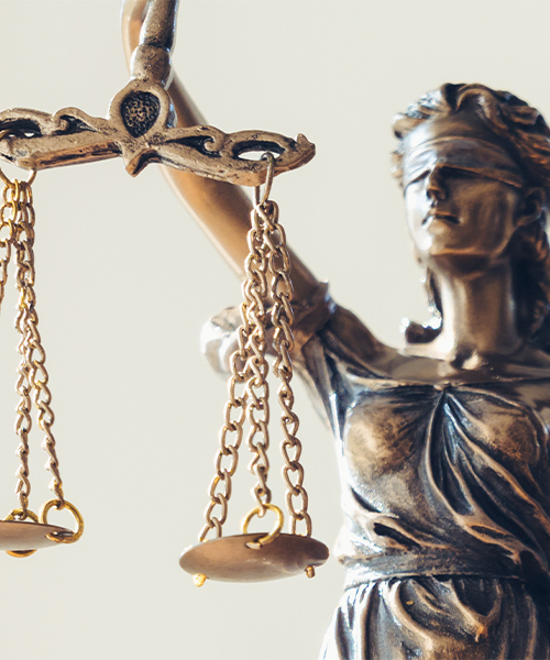 Legal and law concept statue of Lady Justice with scales of justice