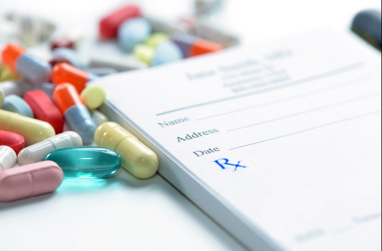 Pills next to the prescription